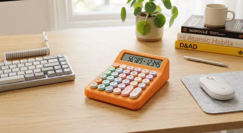 Orange retro calculator with pastel round mechanical keys
